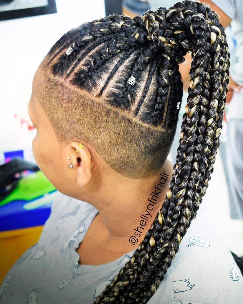 Half Shaved Hairstyle with Cornrows