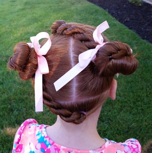girls' double buns with twists hairstyle