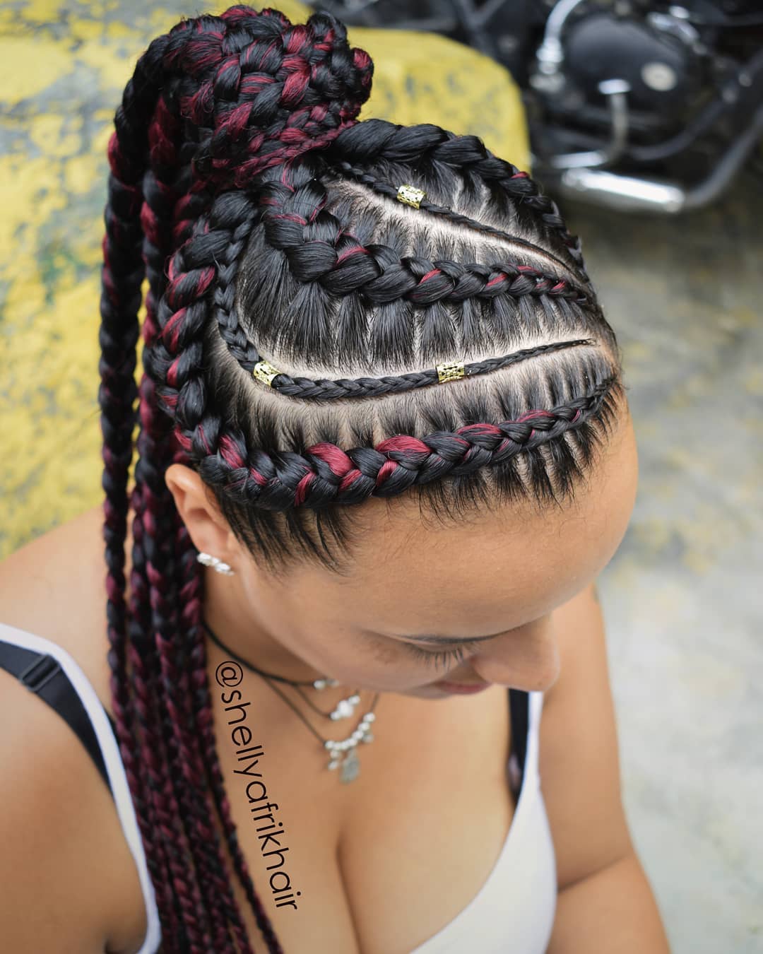 Ponytail With Burgundy Highlighted Braids