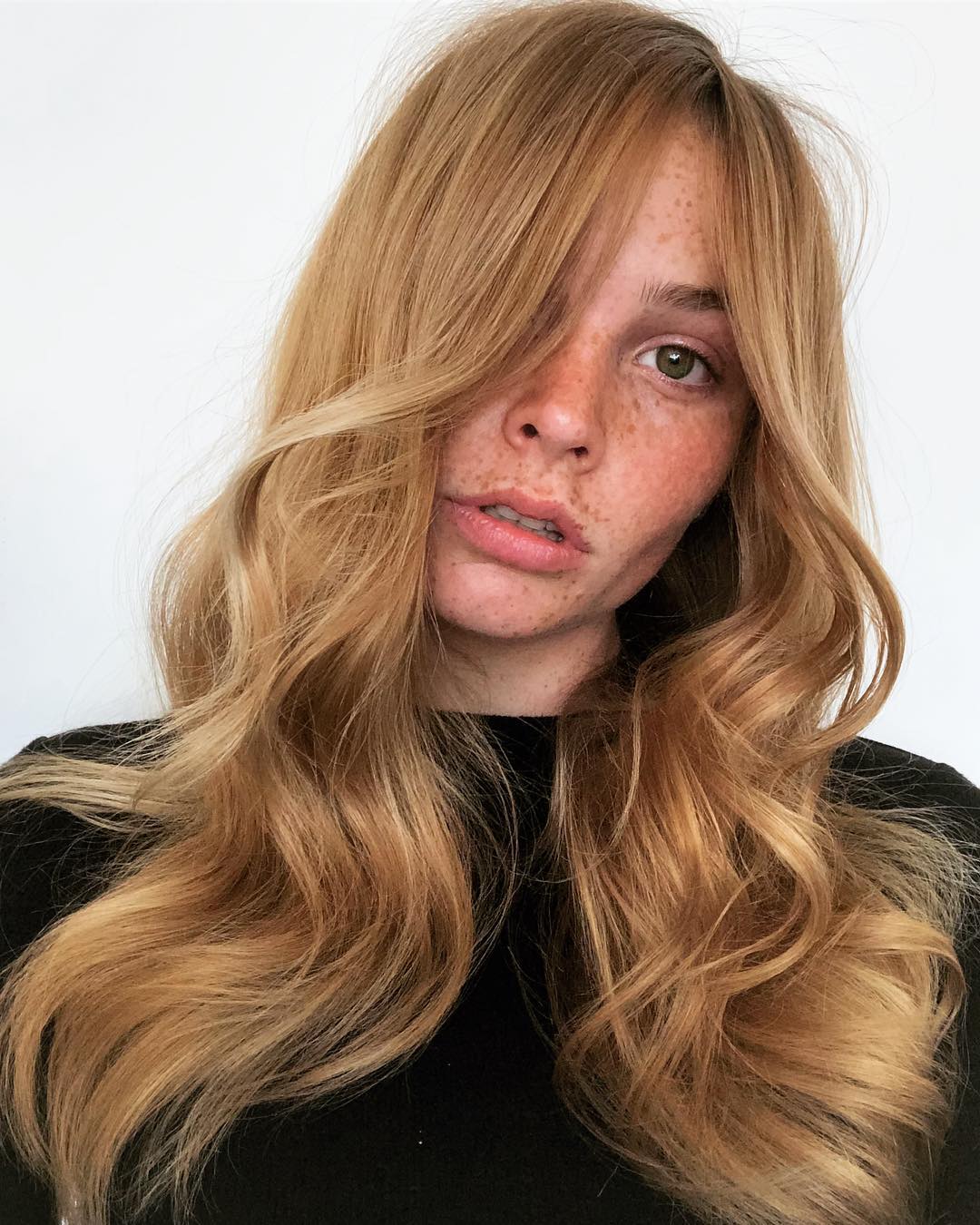 Long Wavy Strawberry Blonde Hairstyle