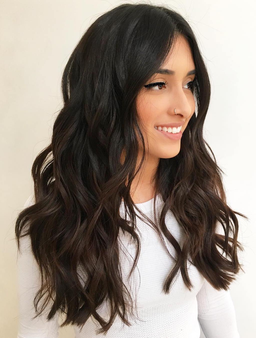 Long Wavy Centre-Parted Hairstyle