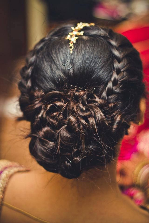 low bun hairstyle for Indian style wedding