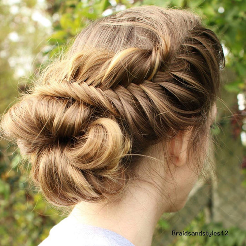 loose messy fishtail and bun updo