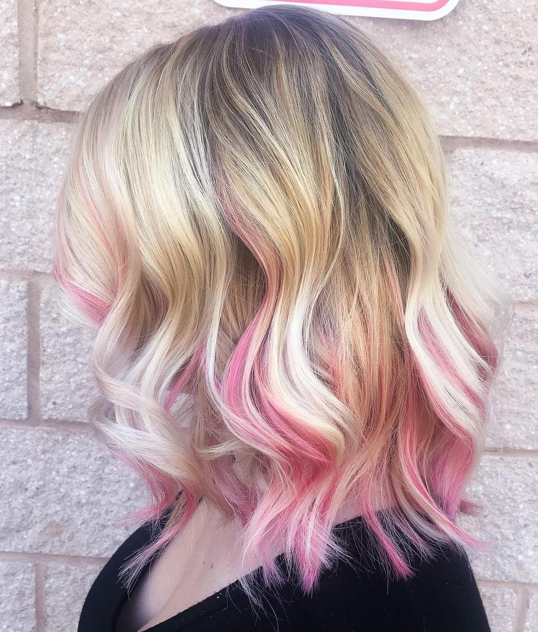 blonde lob with pastel pink highlights