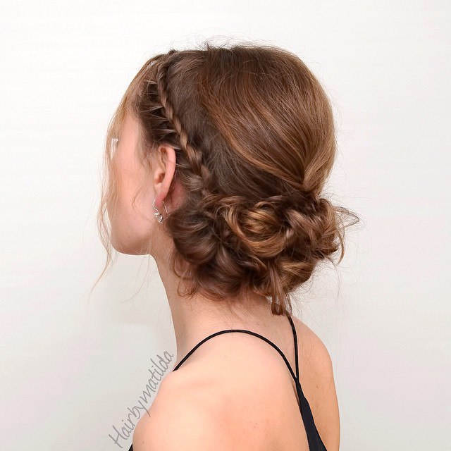 Low Curly Bun With A Braid