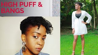 High Puff And Bangs Hairstyle.
