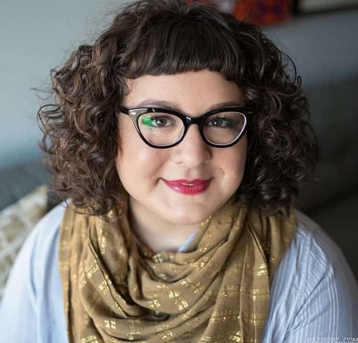 curly hair with bangs and glasses