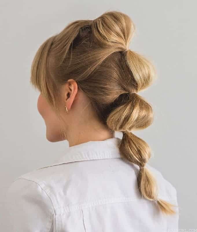 bubble ponytail with bangs