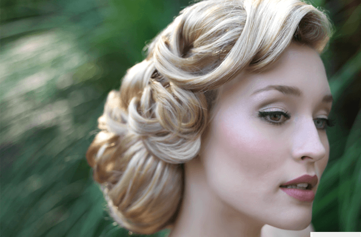 Low curly bun vintage wedding hairstyles for women 
