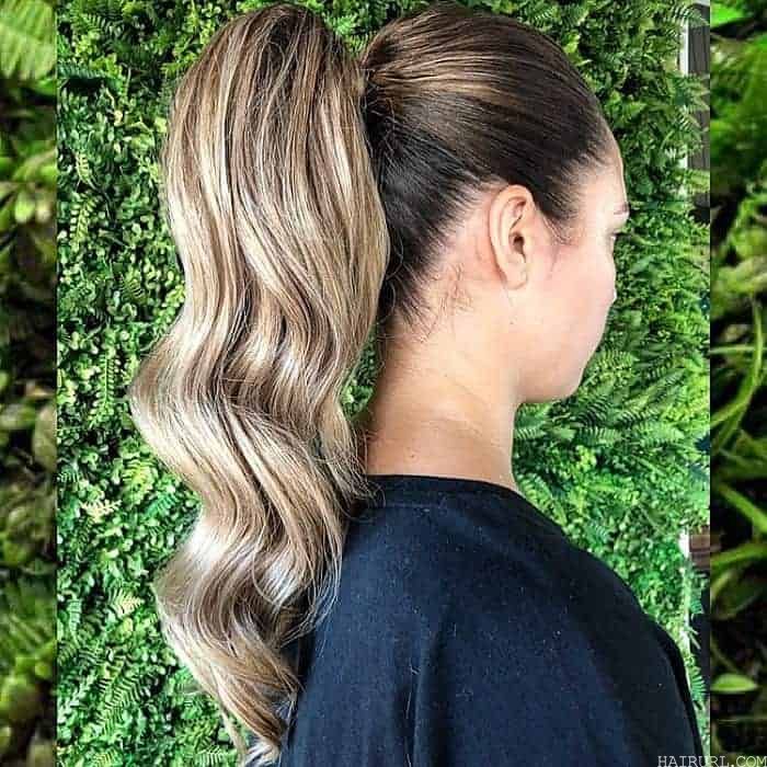 high ponytail in blonde balayage hair