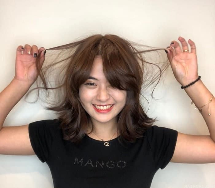 How to Style Shoulder-Length Hair with Bangs and Layers
