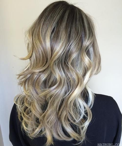 Ashy Blonde Layered Hair with Golden Highlights