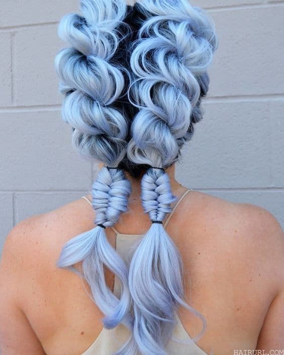 women with ice blue braids
