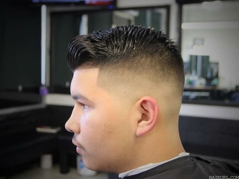fohawk fade hair with wavy top for men 