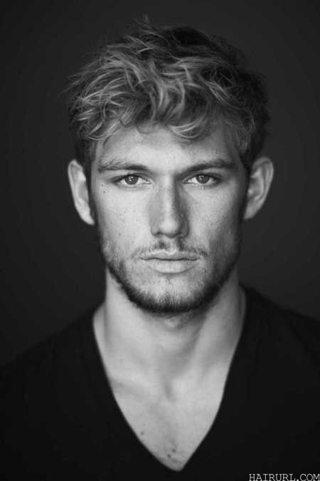 curly medium hairstyle for men