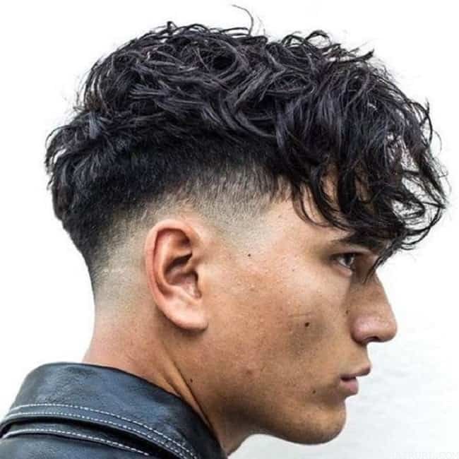 Messy Hair with a Low Mid Fade Undercut