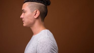 11 Suave Man Bun Hairstyles with Shaved Sides We Love