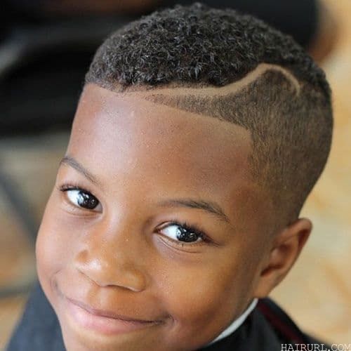 black boy's hairstyle with part fade