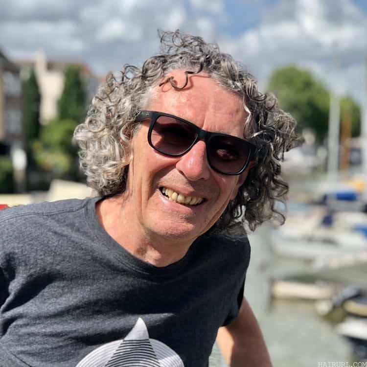 curly hairstyle for man over 50 