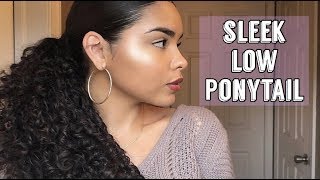 Sleek Low Ponytail On Curly Hair