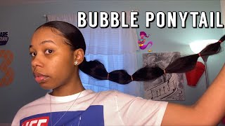 Sleek Low Bubble Ponytail With Weave