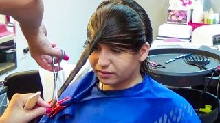 Nice Woman Getting A New Style In Long Hair, Now Very Layered And With Bangs